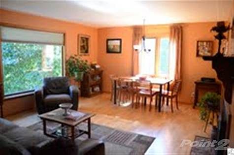 Fresh paint, newer flooring, large picture window overlooking beautiful backyard.