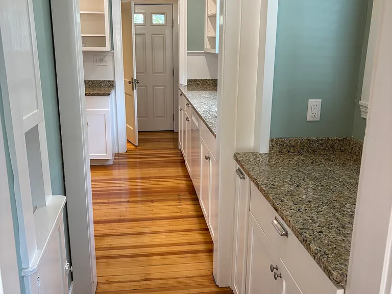 Pantry leading to kitchen