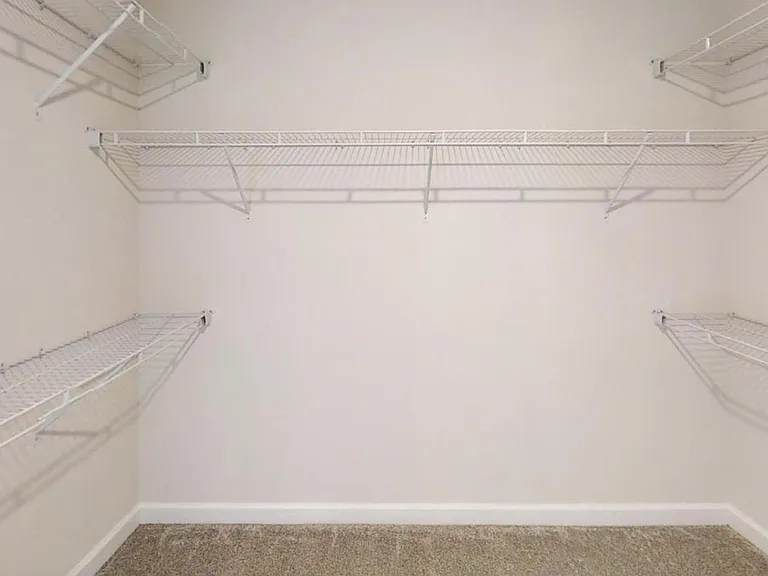 Walk in closet in master bedroom
