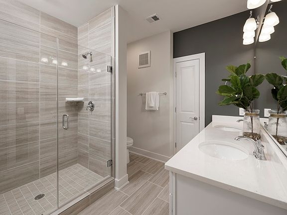 Luxurious Owner s Bath with an Optional Frameless Shower