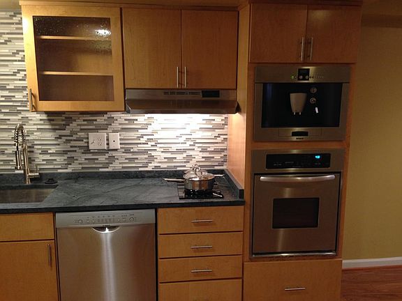 Modern gourmet kitchen with espresso maker