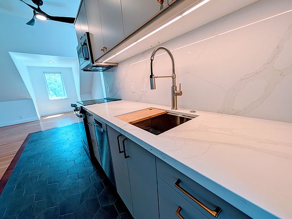 New quartz counters and backsplash