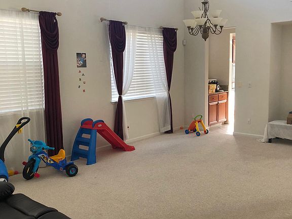 Formal living area & dining (high ceilings)