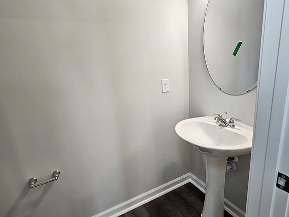 Powder room before stairs