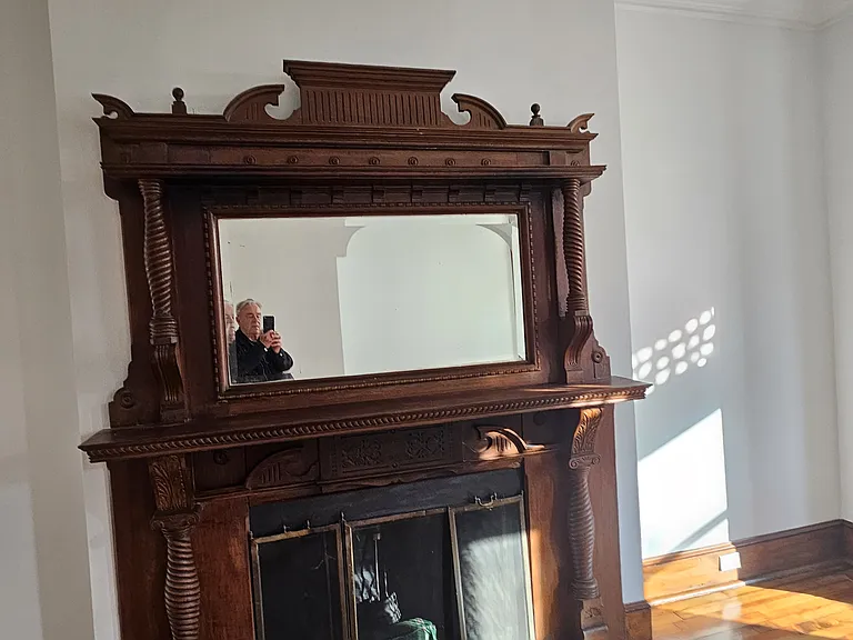 2nd floor suite: private living room fireplace mantle.