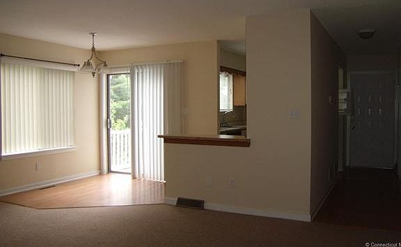 Dining area with view of ki...