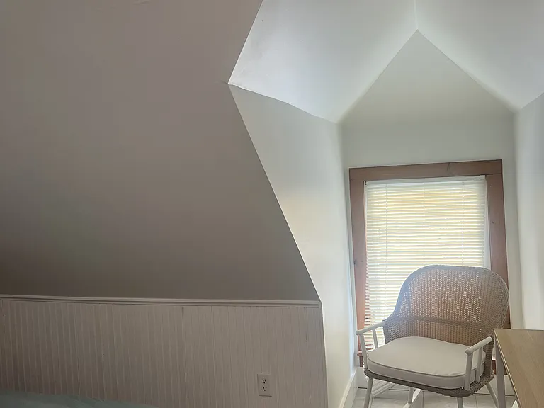 Attic bedroom: Rocking chair and Desk