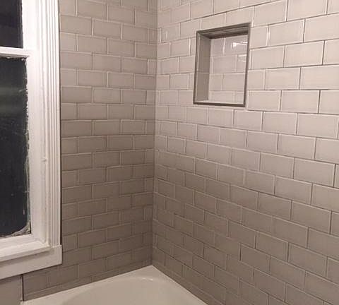 Refinished tub and subway tile