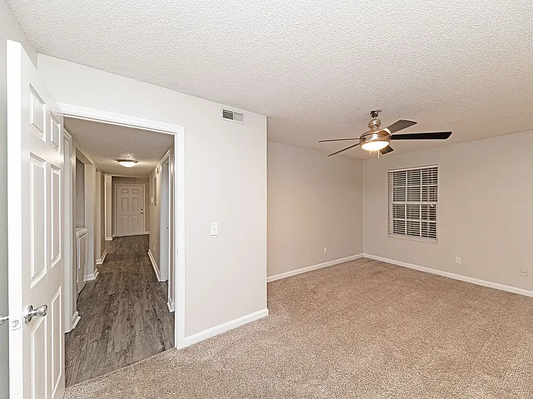 Bedroom with carpet & ceiling fan