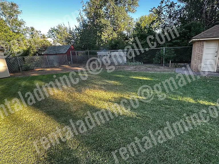Large fenced backyard.