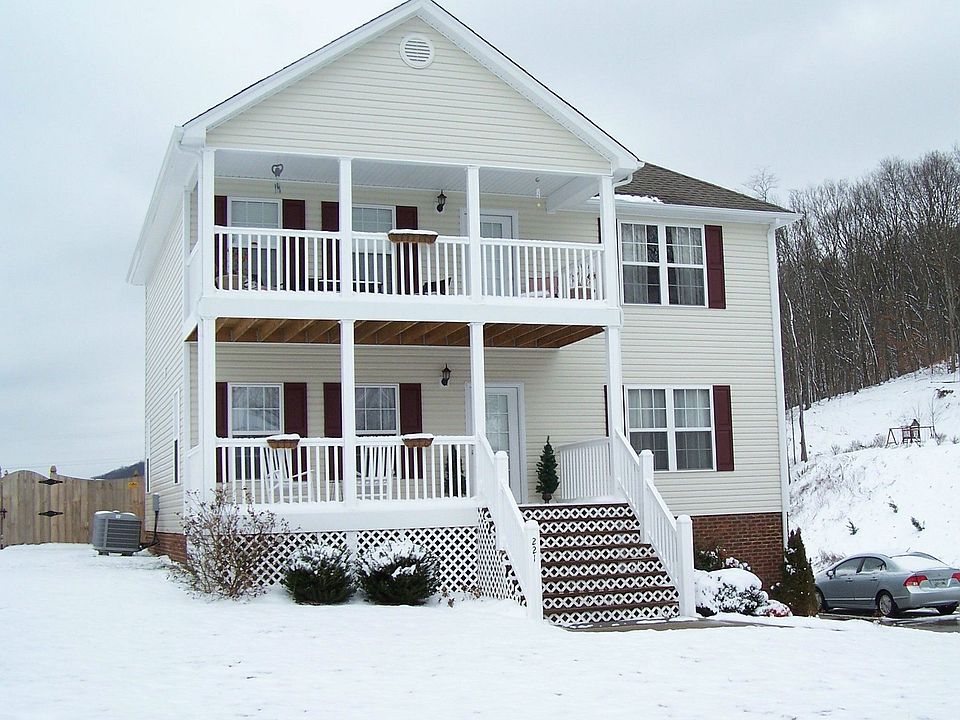 Front with 2 covered porches
