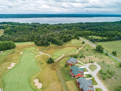 31/32 Old Orchard Trl, Kewadin, MI, 49648