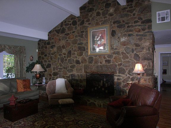 rock wall in living room w/fireplace