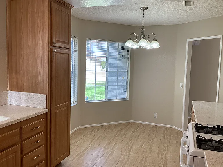 Kitchen featuring eat-in nook.