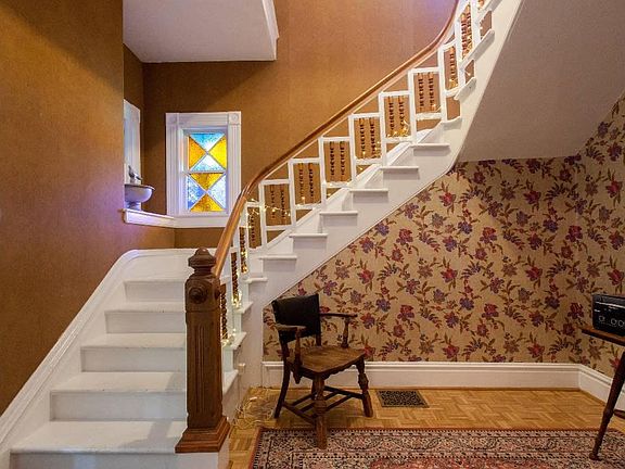 Ground floor foyer with original 1892 stained glass