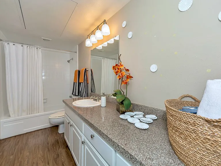 Updated bathroom vanity with modern lighting