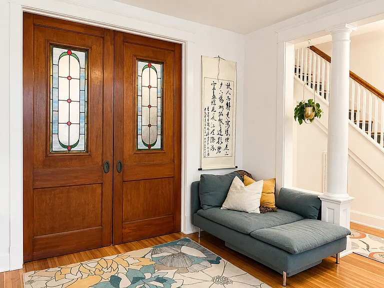 Pocket doors connecting the living room and reading room