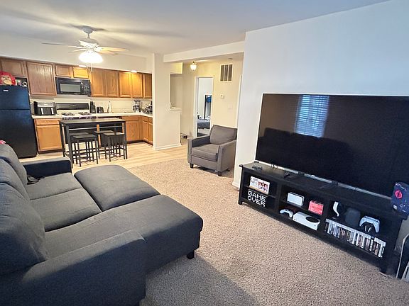 Open concept dining/living carpet is being replaced with brand new flooring to match kitchen.