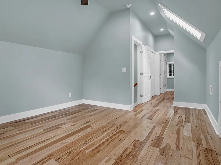Upstairs master suite with vaulted ceilings