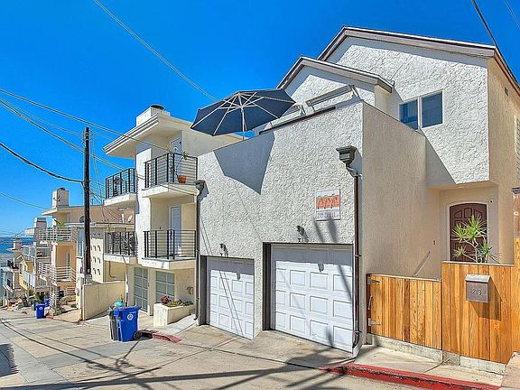 2 car side by side parking in the garage. A luxury at the beach