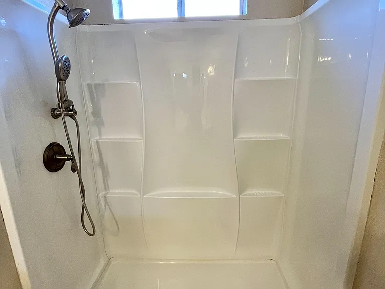 BEDROOM 1 - PRIVATE SHOWER