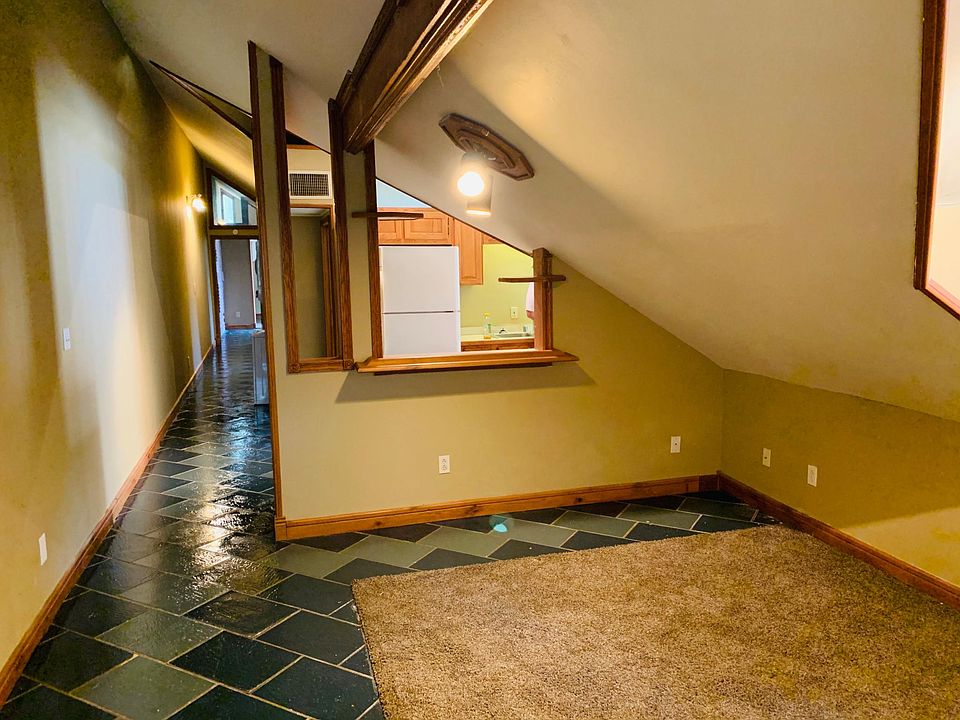 Facing living area and kitchen. Both bedrooms and the bathroom is down the hall.