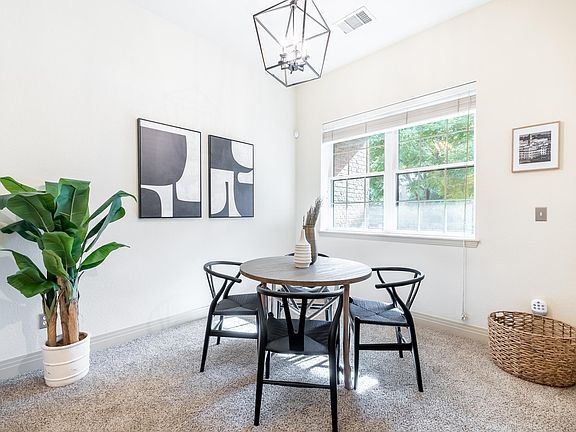 Dining Room with Gas Fireplace Plenty of Natual Lighting