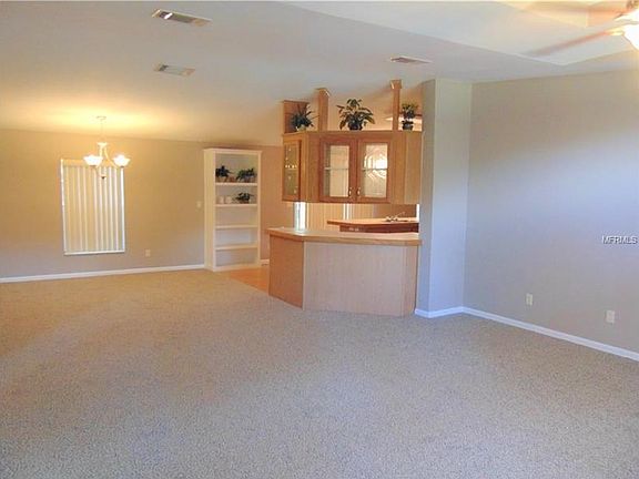 Living and dining room towards kitchen
