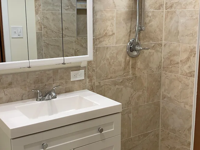 Bathroom sink and shower, downstairs