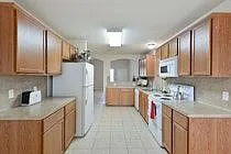 This home is clean and bright, roomy and full of storage shelves.