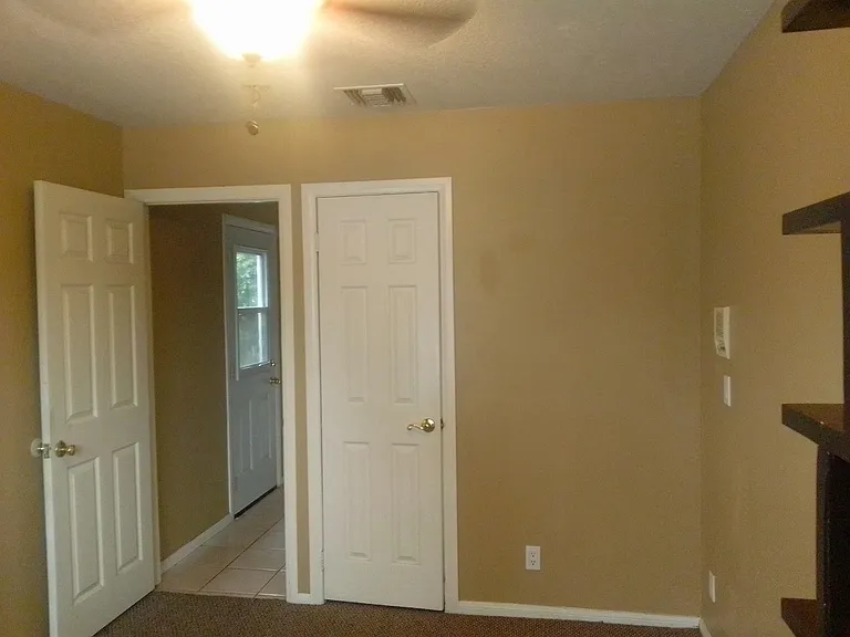 First floor bedroom off kitchen.