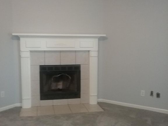 Great room with fireplace, tray ceiling
