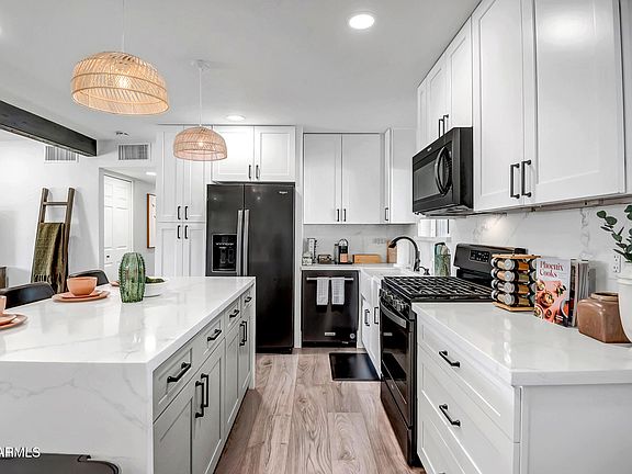 5th image of 7502 E LATHAM Street