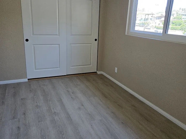 North bedroom with fan.