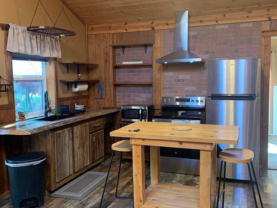 Kitchen with dining island.