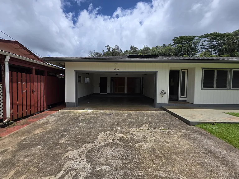 Fully enclosed garage with garage door opener