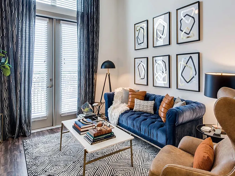 Griffis Frisco apartment living room with wood style floor.