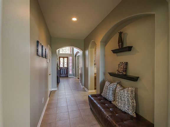 From the moment you enter the home you will notice the tall ceilings, wide entry and neutral color palette.