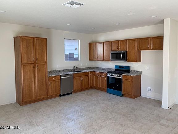 5th image of 8961 W SAN JUAN Avenue