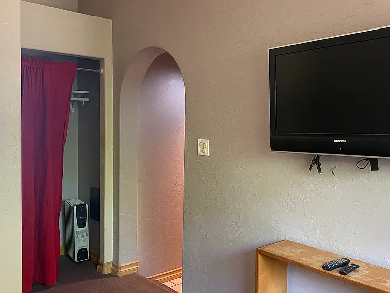 Closet and Arched doorway, from hallway.
