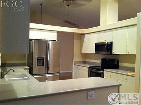 Open Kitchen with top of the line Stainless Appliances.