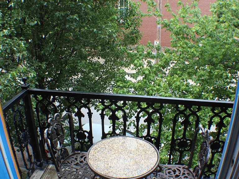 The balcony located outside the upstairs hallway.