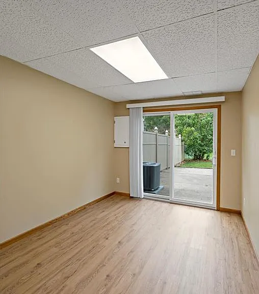 Dining room with sliding door access to the huge fully fenced-in back yard complete with concrete patio and privacy fence