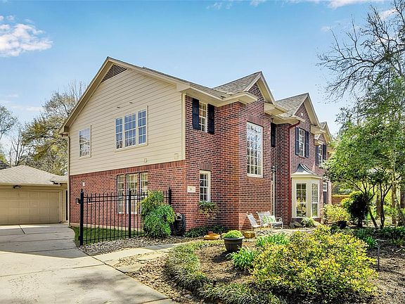 The driveway can be closed off with a gate for extra security or left open to access the oversized two car garage.