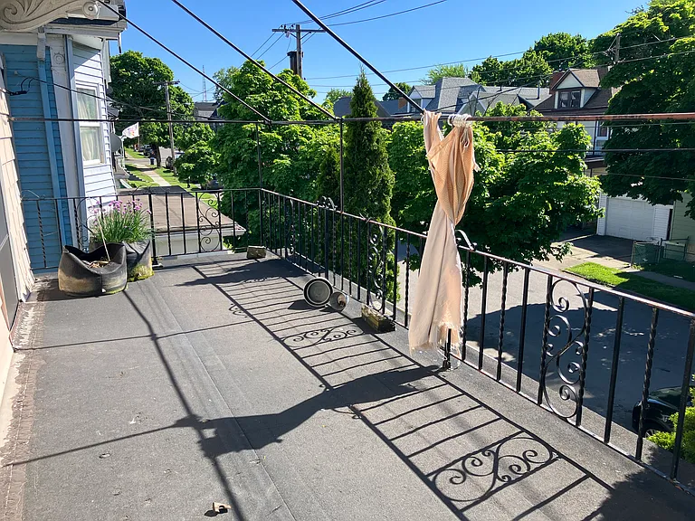 Upper porch - tenant must use outdoor carpet if placing furniture outside