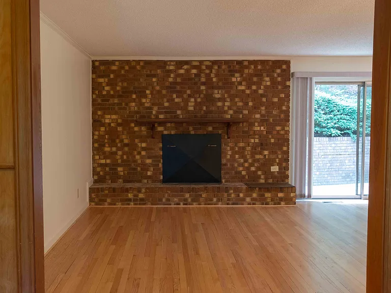 Living room with newly refinished oak floors