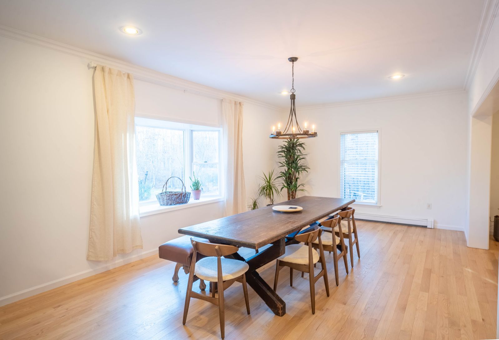  dining room with gorgeous bay window overlooking the patio and seating for 10+