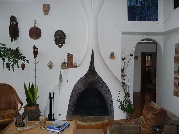 Living room centerpiece - fireplace by James Hubbell