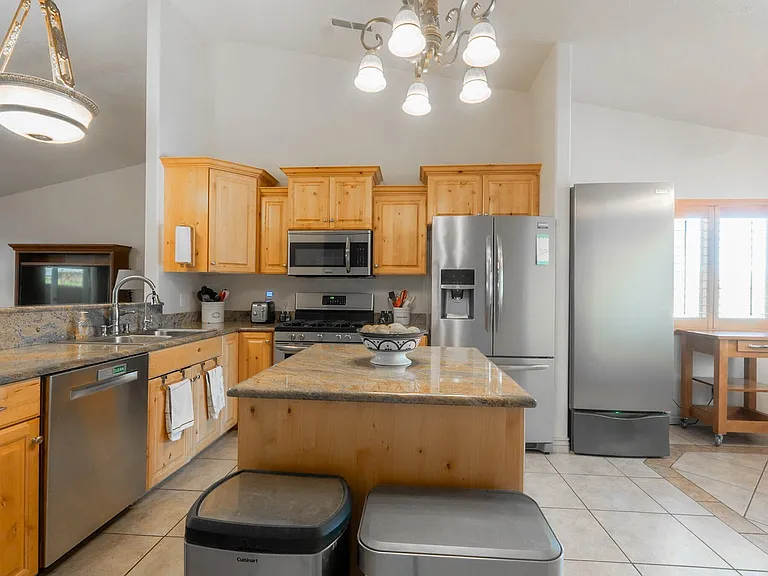 Kitchen, all stainless steel appliances, stone counter tops