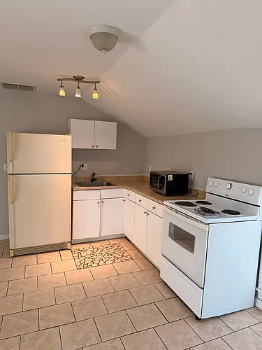 403 E 6th 1/2 St Photo 1